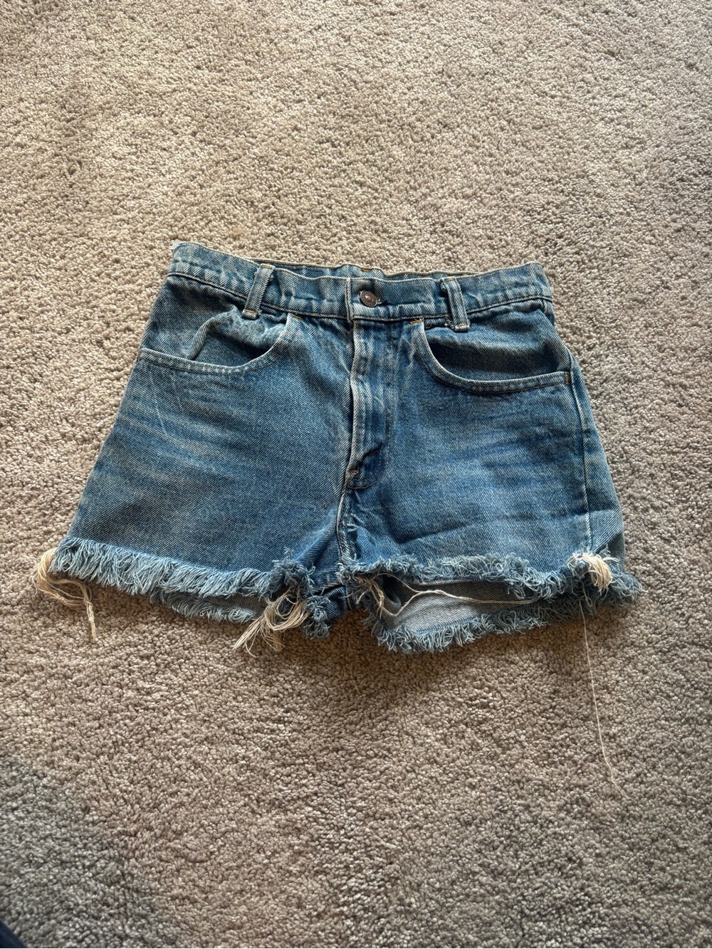 Orange tab vintage Levi's Medium Blue Frayed Denim Cutoff Shorts